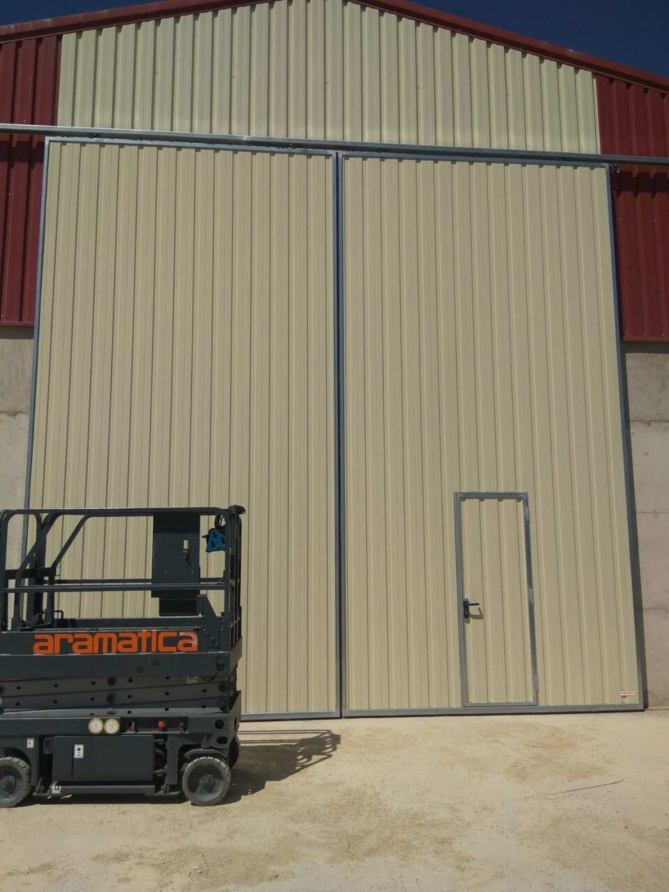 Puerta corredera suspendida